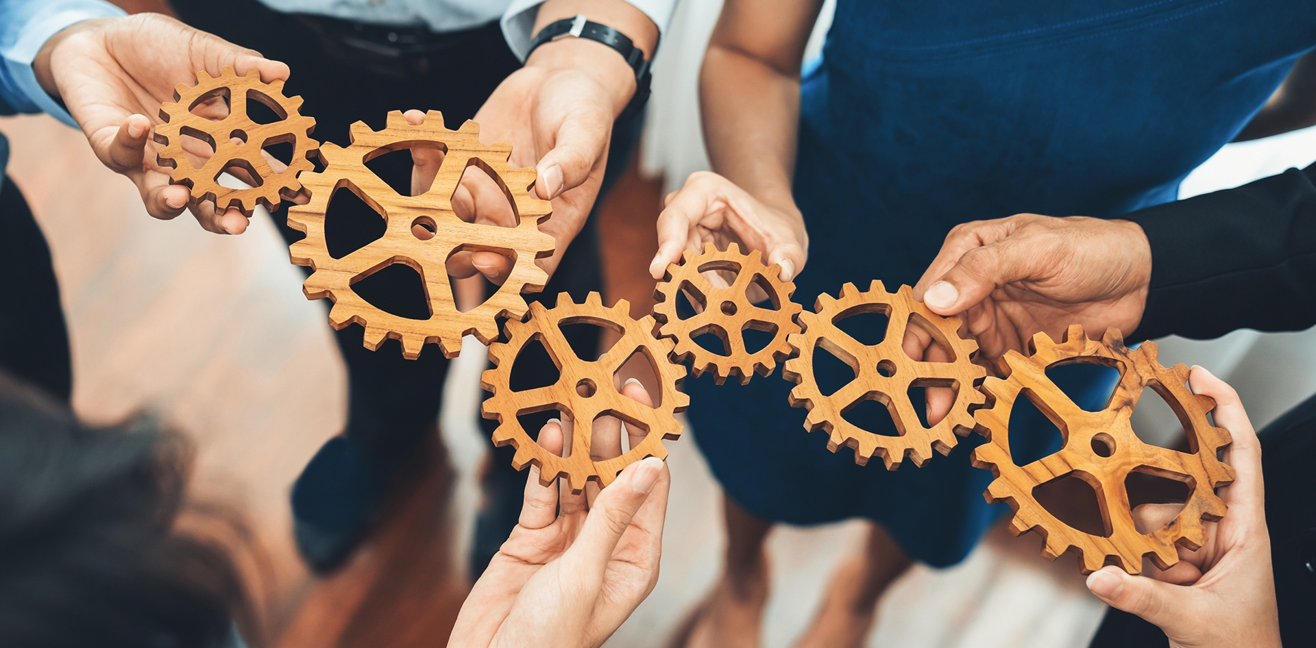 people holding gears